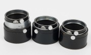 LEITZ: Three Leica FIKUS variable lens hoods, each with a different variation in engraving detail.&nbsp;(3 items) - 2