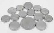 LEITZ: Fourteen metal Leica front lens caps. (14 items)