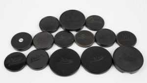 LEITZ: Fourteen Leica front lens caps - eight metal and six plastic. (14 items)