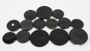 LEITZ: Fourteen Leica front lens caps - eight metal and six plastic. (14 items)