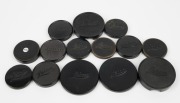 LEITZ: Fourteen Leica front lens caps - eight&nbsp;metal and six plastic. (14 items)