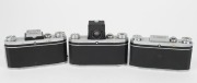 KAMERA-WERKST&Auml;TTEN: Three 1950s&nbsp;SLR cameras - one Praktica FX with Cassar S 50mm f2.8 lens [#1140693], one Praktica FX2 with Tessar&nbsp;50mm f2.8 lens [#5084679], and one Praktica F.X3 with Tessar&nbsp;50mm f2.8 lens [#5369075] and shutter release cable. - 2