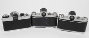 KAMERA-WERKST&Auml;TTEN: Three SLR cameras - two circa 1960 Praktica&nbsp;IV models with Tessar&nbsp;50mm f2.8 [#6314926] and Meritar&nbsp;50mm f2.9 [#1324764] lenses respectively,&nbsp;and&nbsp;one circa 1972&nbsp;Praktica LB with Domiplan&nbsp;50mm f2.8 lens [#6157381]. (3 cameras) - 3