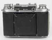 HOUGHTON: Ensign Commando horizontal-folding rangefinder camera [#C3989], circa 1947, with Ensar 75mm f3.5 lens [#8387] and Epsilon shutter.    - 3