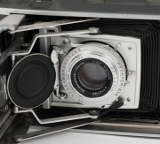 POLAROID: A selection of five instant rollfilm cameras, circa late 1950s, comprising two Polaroid 110A Pathfinder models with viewfinder attachment, two Polaroid J66 models, and one Polaroid 160 model. (5 cameras) - 4