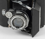 ZEISS IKON: Super Ikonta A 531 vertical-folding camera [#G 72944 *], circa 1950, with rare Novar 75mm f3.5 lens and Compur shutter. - 2