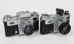 KIEV ARSENAL: Two Contax-copy rangefinder cameras - one 1982 Kiev-4am [#8248862] with 53mm f8 lens [#8298334] and finder attachment, and one 1979 Kiev-4 [#7927172] with 53mm f2 lens [#8026430]. (2 cameras)