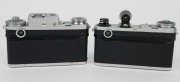 KIEV ARSENAL: Two Contax-copy rangefinder cameras - one 1982 Kiev-4am [#8248862] with 53mm f8 lens [#8298334] and finder attachment, and one 1979 Kiev-4 [#7927172] with 53mm f2 lens [#8026430]. (2 cameras) - 3