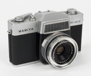 MAMIYA: Mamiya Auto-Lux 35 SLR camera [#657300], circa 1965, with Mamiya-Sekor 48mm f2.8 lens and Copal-X shutter.