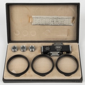 ZEISS IKON: Contameter 1343 close-up kit [#W.93816], circa 1936, with three individual eyepieces and 20mm, 30mm, and 50mm 995/34 lenses, presented in original black leather case.