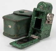 CORONET: Green-body Midget subminiature Bakelite box camera, circa 1935, with Taylor Hobson Meniscus lens, together with leather maker's pouch. - 2