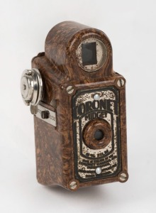 CORONET: Brown-body Midget subminiature Bakelite box camera, circa 1935, with Taylor Hobson Meniscus lens. 