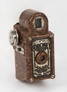 CORONET: Brown-body Midget subminiature Bakelite box camera, circa 1935, with Taylor Hobson Meniscus lens.