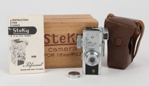 RIKEN OPTICAL: Steky IIIa subminiature camera [#12875 1], circa 1954, with Stekinar 25mm f3.5 lens. Presented in wooden box with leather body casing, metal lens cap, and instruction booklet.