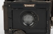 ZEISS IKON: Deckrullo Nettel strut-folding camera [#452121], circa 1928, with Tessar 150mm f4.5 lens [#985256] and leather lens cap. - 2