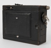 ZEISS IKON: Deckrullo Nettel strut-folding camera [#452121], circa 1928, with Tessar 150mm f4.5 lens [#985256] and leather lens cap. - 4