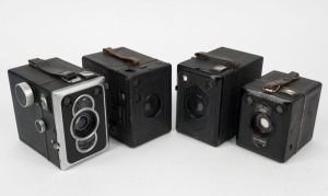 ZEISS IKON: Four early-to-mid 20th-century box cameras with leather carry straps - one Baldur Box 51/2, together with three different Box Tengor models. (4 cameras)