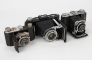 KODAK: Three folding cameras - one circa 1936 Duo Six-20 [#244949K], one circa 1937 Retina I 141 [#239099K], and one circa 1951 Six-20 Model A [#H.189]. (3 cameras)