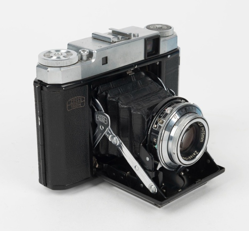 ZEISS IKON: Circa 1953 Super Ikonta III 531/16 horizontal-folding camera [#C 99558], with Opton Tessar 75mm f3.5 lens [#1157609] and Synchro-Compur shutter.