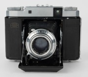 ZEISS IKON: Circa 1953 Super Ikonta III 531/16 horizontal-folding camera [#C 99558], with Opton Tessar 75mm f3.5 lens [#1157609] and Synchro-Compur shutter. - 2