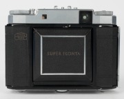 ZEISS IKON: Circa 1953 Super Ikonta III 531/16 horizontal-folding camera [#C 99558], with Opton Tessar 75mm f3.5 lens [#1157609] and Synchro-Compur shutter. - 3