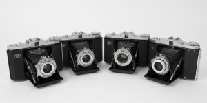 ZEISS IKON: Four circa 1950 horizontal-folding cameras with varying lens and shutter combinations - two Nettar 518/16 [#T 15792 & #J 94349] and two Nettar 517/16 [#V 27720 & #G 34035]. (4 cameras)