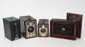 KODAK: A selection of four different early 20th-century box cameras, including No. 2 Brownie F, Six-20 Brownie, and Six-16 Brownie Junior models. (4 cameras)