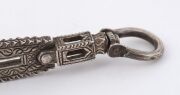 Rare antique Indian silver hookah tongs, West Gujarat origin, border with Sind, 19th century, finely engraved and crafted with two crouching tigers, 34cm long, 131 grams. PROVENANCE: Private Collection, Melbourne. Acquired in October 1988 from Framroz So - 8