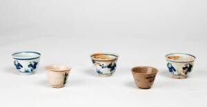 Four Chinese blue and white tea bowls and a fifth