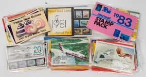 PAPUA NEW GUINEA: Decimal period collection/accumulation in Hagner album, plus a collection of Post Office Packs in accompanying box. (100s) MUH.