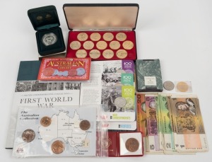 AUSTRALIA: A few oddments in a small box; noted 2000 $5 Sydney Olympic silver proof; a carded pre-decimal coin set; a 1982 cased medallic set; the 2015 Anzacs Remembered 20c coin set; $1 and $2 banknotes (11 each); $5 and $20 banknotes (1 each), etc.