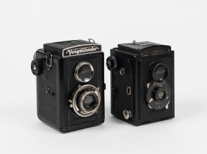 VOIGTLÄNDER: Two Brillant TLR cameras - one 1932 model [#E206251] with Voigtar 75mm f7.7 lens, the other a 1937 V6 model with Voigtar 75mm f4.5 lens [#3031303], with original yellow lens filter in side compartment. (2 cameras)