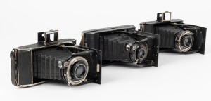 VOIGTLÄNDER: Three Bessa vertical-folding cameras - one 1929 model with Voigtar 120mm f7.7 lens, one 1937 model with Voigtar 105mm f6.3 lens, and one 1937 model [#6433563] with Voigtar 110mm f4.5 lens and Compur shutter. (3 cameras)