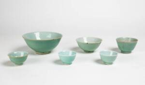Six green glazed porcelain cups and bowls, 19th century, ranging from 16.4cm to 6.7cm diameter