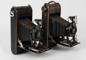 VOIGTLÄNDER: Two Rollfilm vertical-folding cameras - one 1927 model with Voigtar 135mm f6.3 lens [#580822] and Compur shutter, and one 1931 model with Skopar 114mm f4.5 lens [#410902] and Compur shutter. (2 cameras)