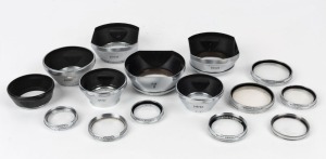 VOIGTLÄNDER: Various camera accessories, including seven lens hoods with markings ranging from 125/20 to 310/49, and eight lens filters of sizes ranging from 32mm to 47mm. (15 items)