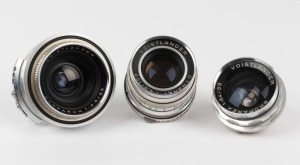 VOIGTLÄNDER: Three lenses - one Skoparon 35mm f3.5 [#4199987], one Skoparex 35mm f3.4 [#6686742] with lens cap, and one Dynaret 100mm f4.8 [#4356948], also with lens cap. (3 lenses)