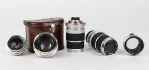 VOIGTLÄNDER: Five lenses with four matching lens caps - one Super-Dynarex 135mm f4 [#5336112], one Skoparex 35mm f3.4 [#5237576] in leather maker's case, one Nokton 50mm f1.5 [#3785679], one Super-Dynaret 135mm f4 [#4533807], and one Septon 50mm f2 [#6280