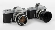 NIPPON KOGAKU: Two circa 1965 Nikon Nikkormat FT SLR cameras -&nbsp;one [#FT 3162279] with Nikkor-H&middot;C&nbsp;Auto 50mm f2 lens [#2233910] and&nbsp;lens hood, the other [#FT 3921513] with Nikkor-S Auto 50mm f1.4 lens [#793849].&nbsp;(2 cameras)