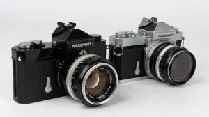 NIPPON KOGAKU: Two circa 1967 Nikon Nikkormat FT SLR cameras - one [#FT 3662869] with black body and Nikkor-S Auto 50mm f1.4 lens [#691425], the other [#FT 3162164] with Nikkor-H Auto 50mm f2 lens [#2040973] and lens cap.