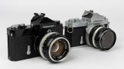 NIPPON KOGAKU: Two circa 1967 Nikon Nikkormat FT SLR cameras -&nbsp;one [#FT 3662869] with black body and&nbsp;Nikkor-S&nbsp;Auto 50mm f1.4 lens [#691425], the other [#FT 3162164] with Nikkor-H&nbsp;Auto 50mm f2 lens [#2040973] and lens cap.