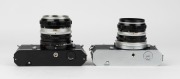 NIPPON KOGAKU: Two circa 1967 Nikon Nikkormat FT SLR cameras -&nbsp;one [#FT 3662869] with black body and&nbsp;Nikkor-S&nbsp;Auto 50mm f1.4 lens [#691425], the other [#FT 3162164] with Nikkor-H&nbsp;Auto 50mm f2 lens [#2040973] and lens cap. - 5