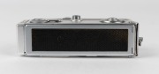 FRANKE & HEIDECKE: Rollei&nbsp;16S&nbsp;subminiature&nbsp;camera&nbsp;[#2745344] with snakeskin&nbsp;leather body, circa 1970, with Tessar&nbsp;25mm f2.8 lens [#4124960]. - 3