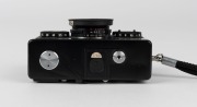 FRANKE & HEIDECKE: Black-body&nbsp;Rollei 35TE compact camera, circa 1980, with Tessar&nbsp;40mm f3.5 lens, rubber lens hood, and wrist strap.&nbsp; - 4