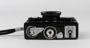 FRANKE & HEIDECKE: Black-body&nbsp;Rollei 35TE compact camera, circa 1980, with Tessar&nbsp;40mm f3.5 lens, rubber lens hood, and wrist strap.&nbsp; - 5