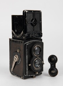 FRANKE & HEIDECKE: Circa 1932 Rolleiflex Old Standard TLR camera [#215135] with Tessar 75mm f3.8 lens [#1339027] and metal lens cap, with directions in German on rear.
