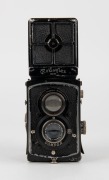 FRANKE & HEIDECKE: Circa 1932 Rolleiflex Old Standard TLR camera [#215135] with Tessar 75mm f3.8 lens [#1339027] and metal lens cap, with directions in German on rear. - 2