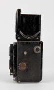 FRANKE & HEIDECKE: Circa 1932 Rolleiflex Old Standard TLR camera [#215135] with Tessar 75mm f3.8 lens [#1339027] and metal lens cap, with directions in German on rear. - 4