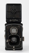 FRANKE & HEIDECKE: Circa 1931 Rolleiflex Original TLR camera [#235230] with Tessar 75mm f3.8 lens [#1387764] and metal lens hood, in maker's box. Later version with hinged back. - 2