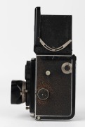 FRANKE & HEIDECKE: Circa 1931 Rolleiflex Original TLR camera [#235230] with Tessar 75mm f3.8 lens [#1387764] and metal lens hood, in maker's box. Later version with hinged back. - 4